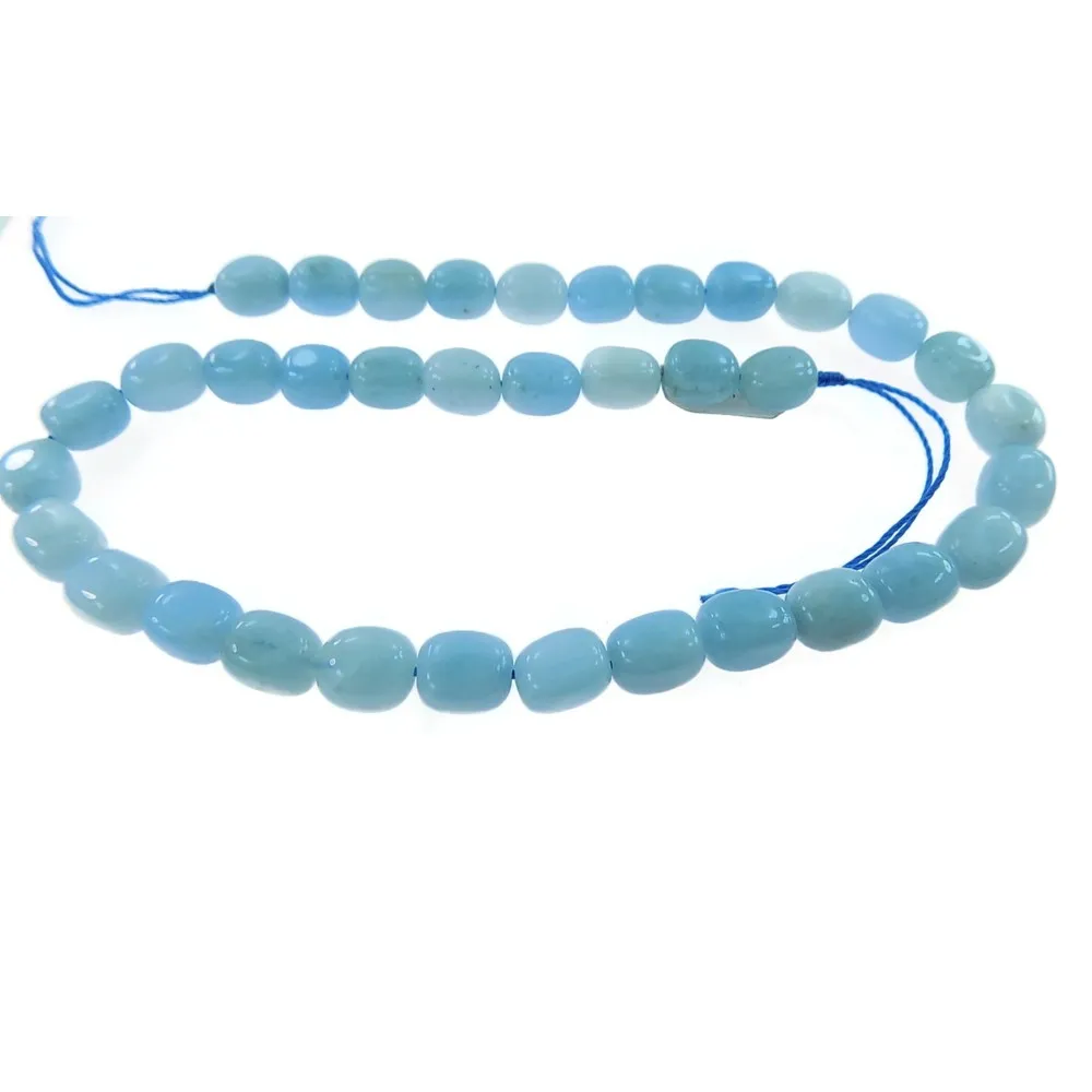 UN FILO DI  ACQUAMARINA  MILK SASSOLINI BURATTATI IRREGOLARI