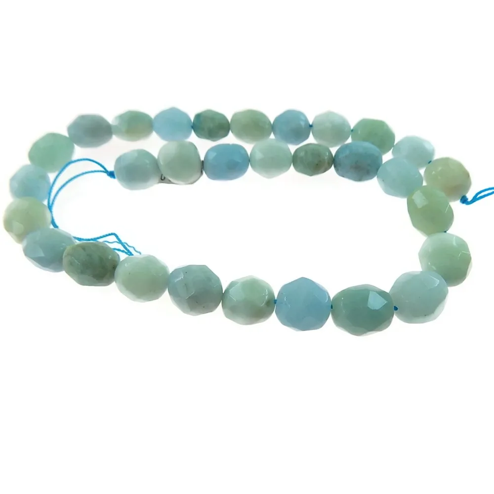 UN FILO DI  ACQUAMARINA MILK SFACCETTATA OVALI IRREGOLARI