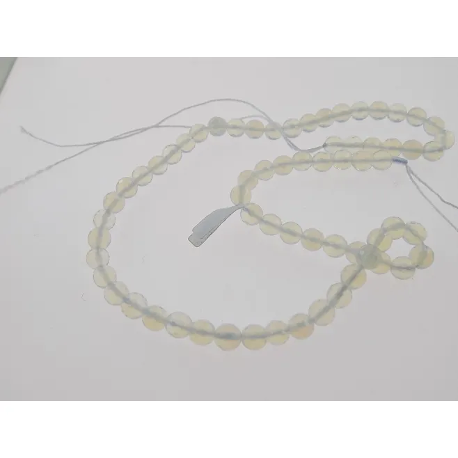 1 filo  di opale mielato tondo sfaccettato mm. 6