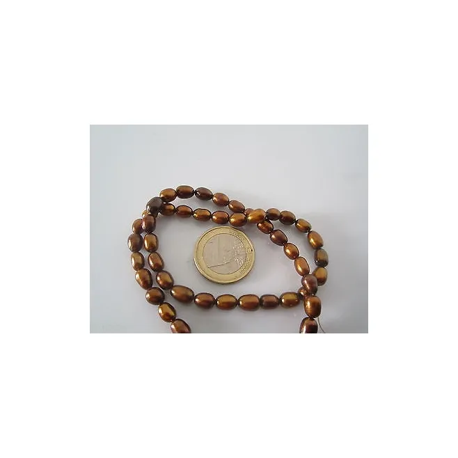 1 FILO PERLE OVALINE COLOR BRONZO COLTIVATE  MISURE 7x6 MM CIRC