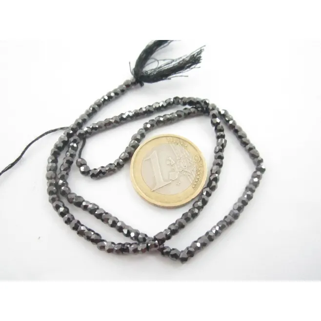 zirconi colore nero rondelle  sfaccettati di 3x2,5 mm 1 filo lungo 33 cm
