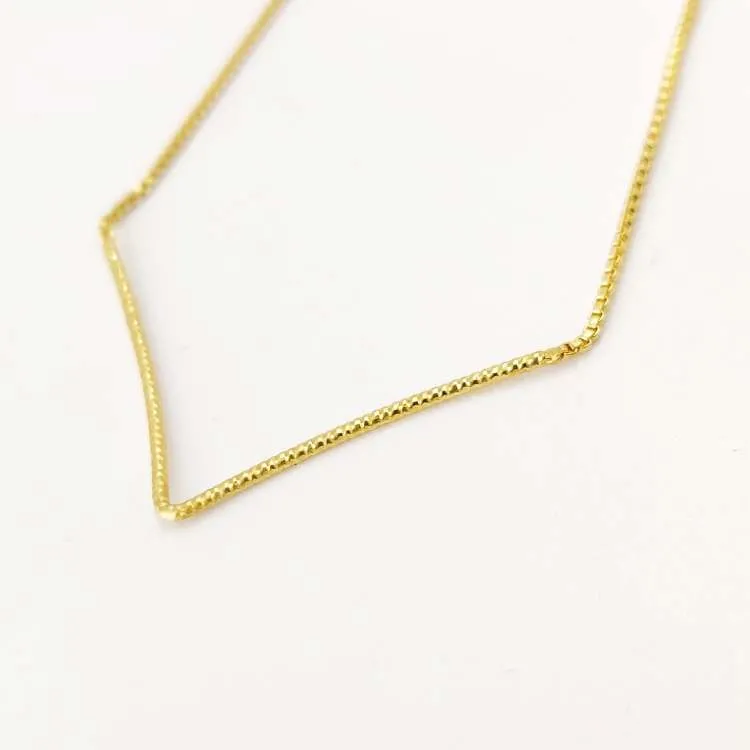 Collana V in argento dorato