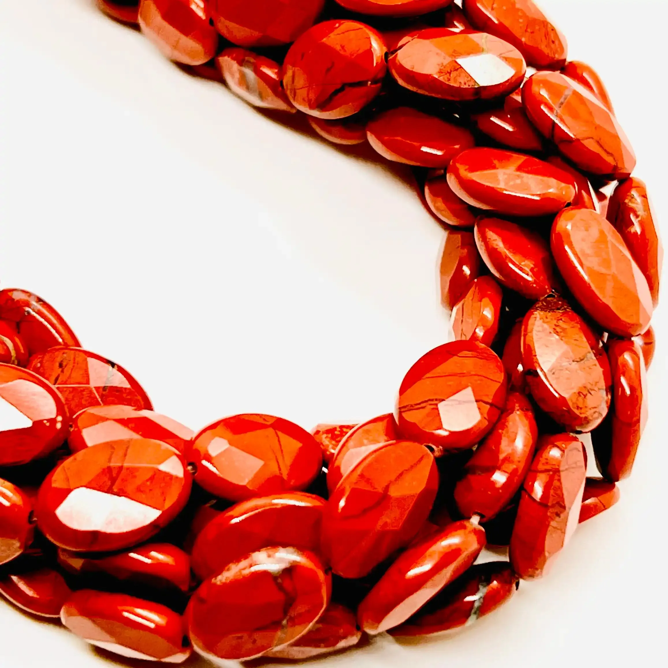 filo di diaspro ovale sfaccettato 10 mm x 6 mm colore rosso brunito