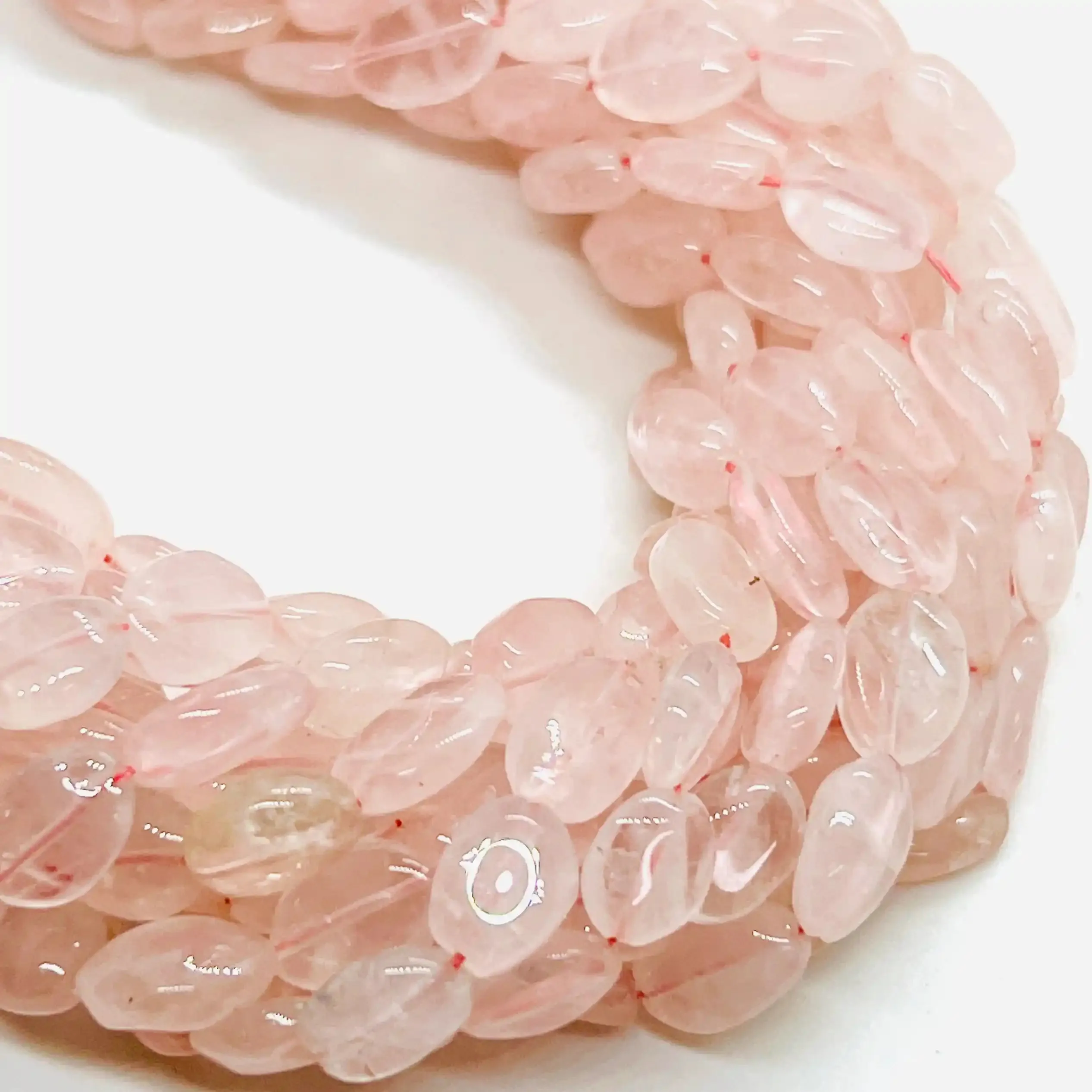 filo di quarzo rosa ovale 10 mm x 7 mm colore rosa pallido