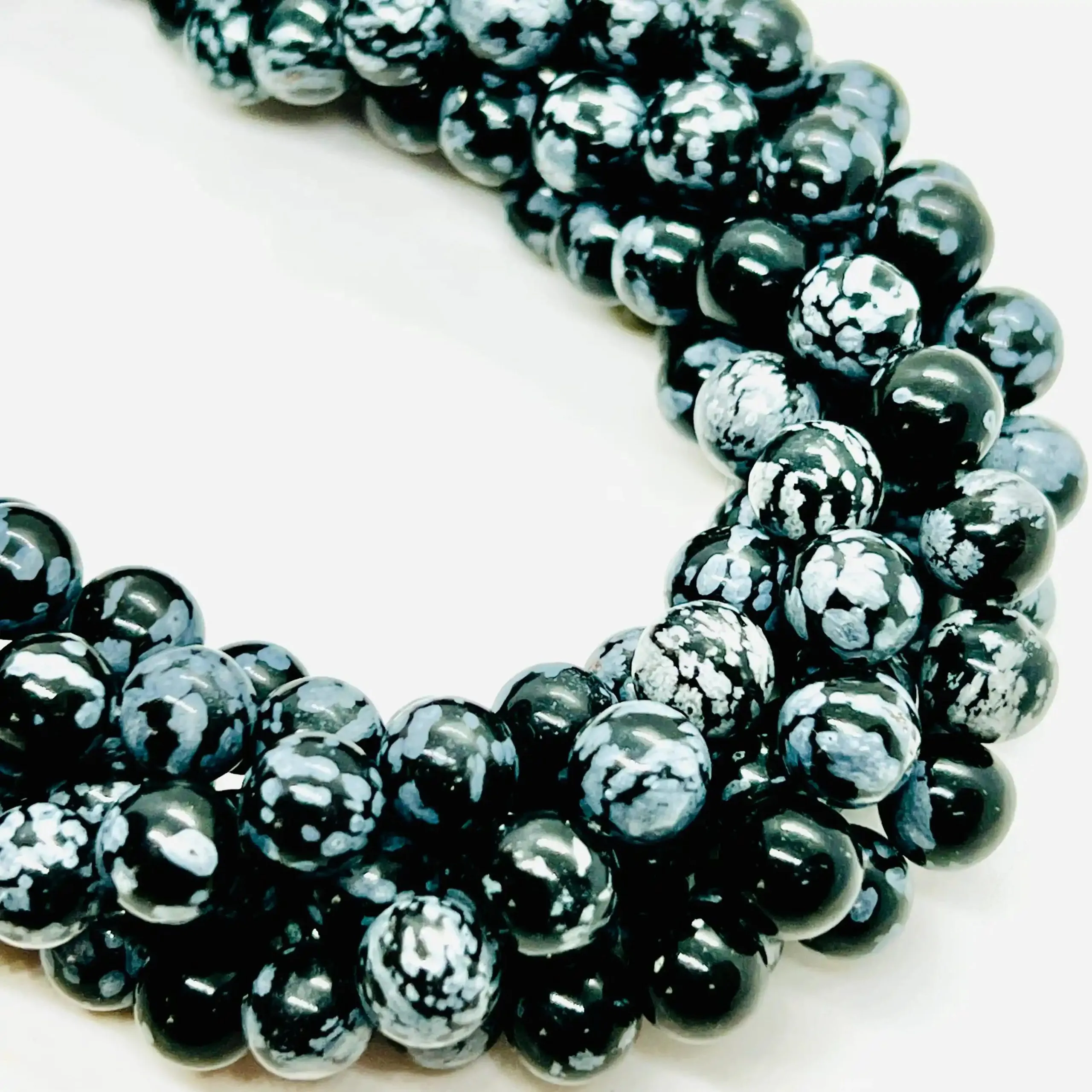 filo di ossidiana sfera 8 mm colore nero e grigio