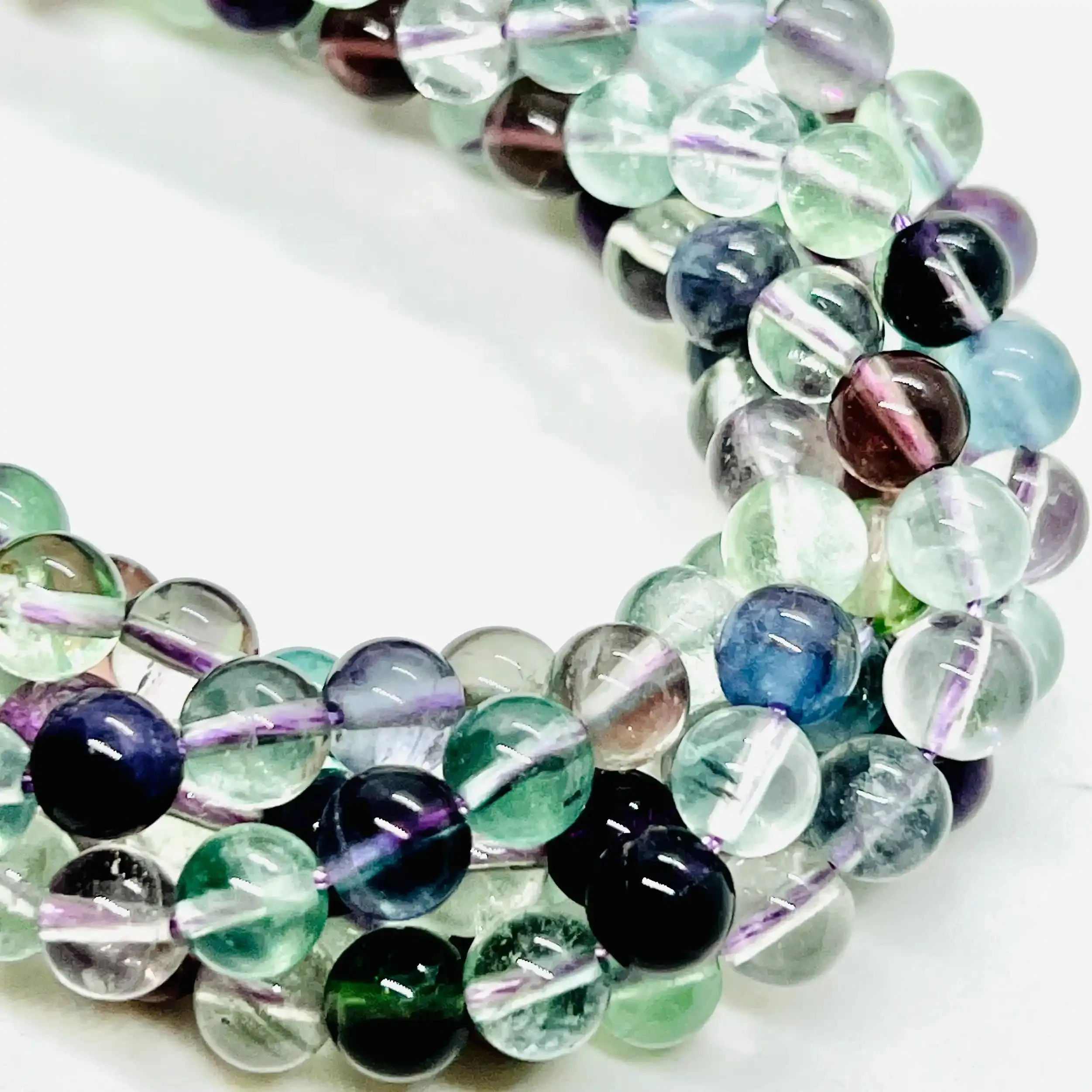 filo di fluorite sfera 8 mm colore viola e verde