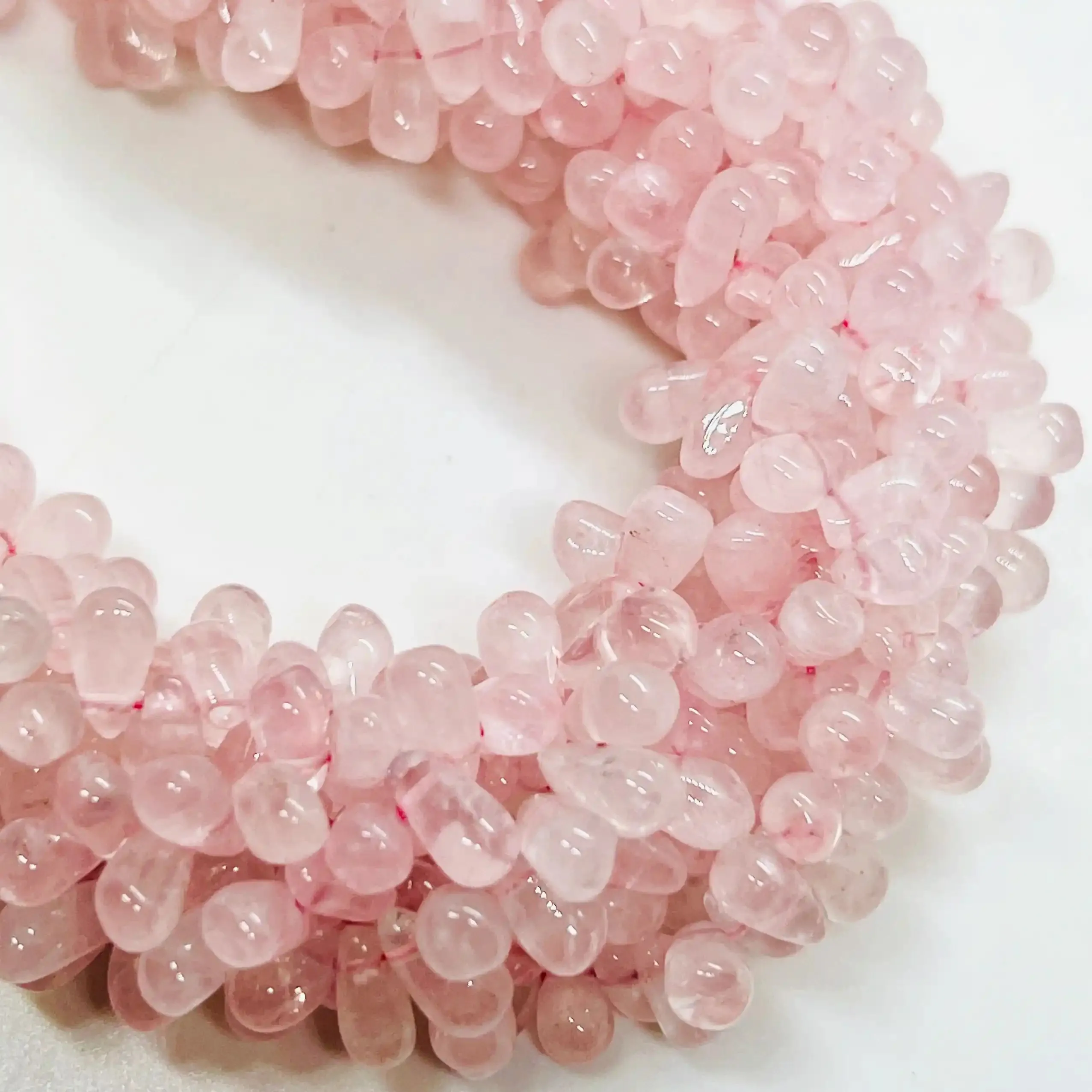 filo di quarzo rosa goccia 10 mm x 3 mm colore rosato