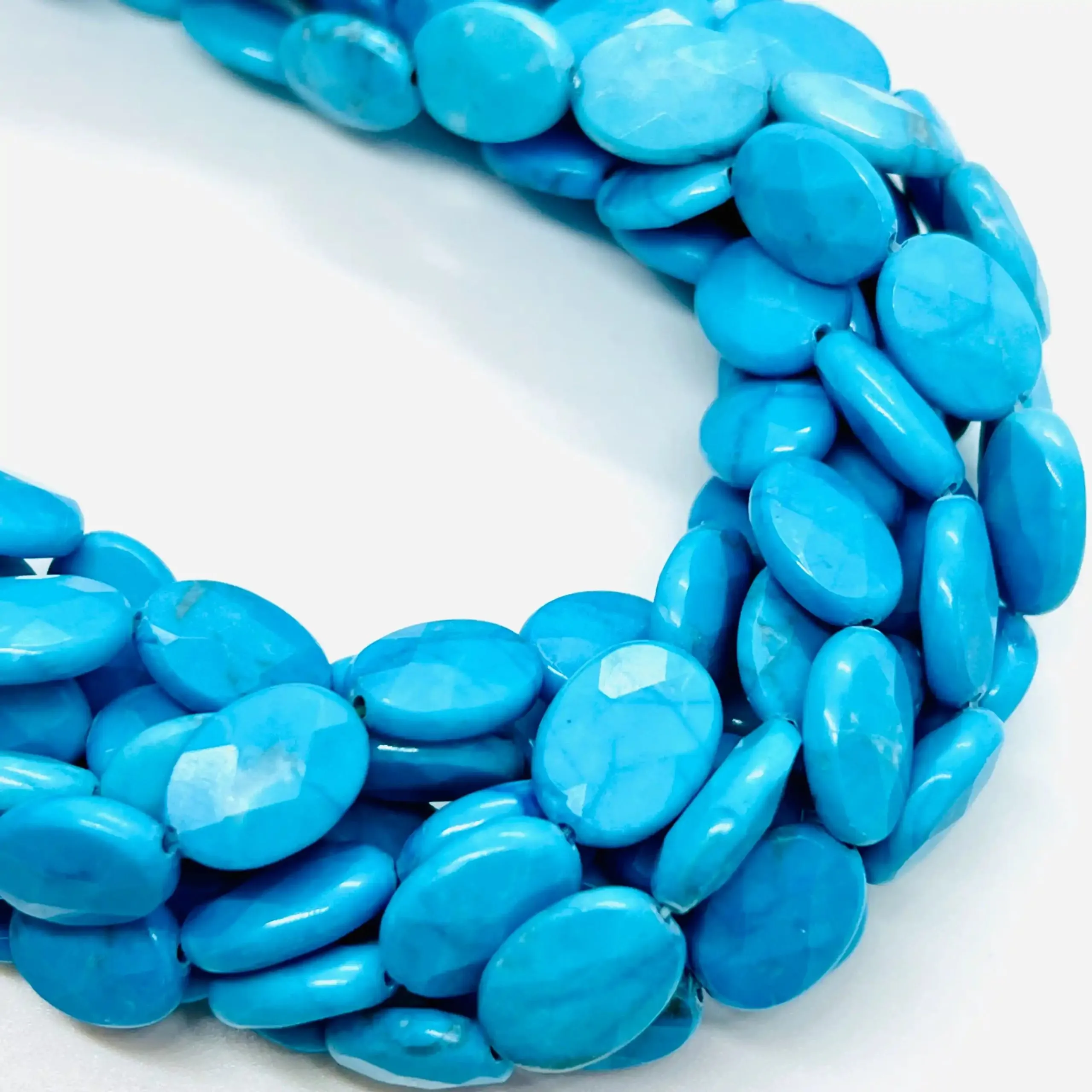 filo di haulite ovale sfaccettato 14 mm x 10 mm colore celeste pastello