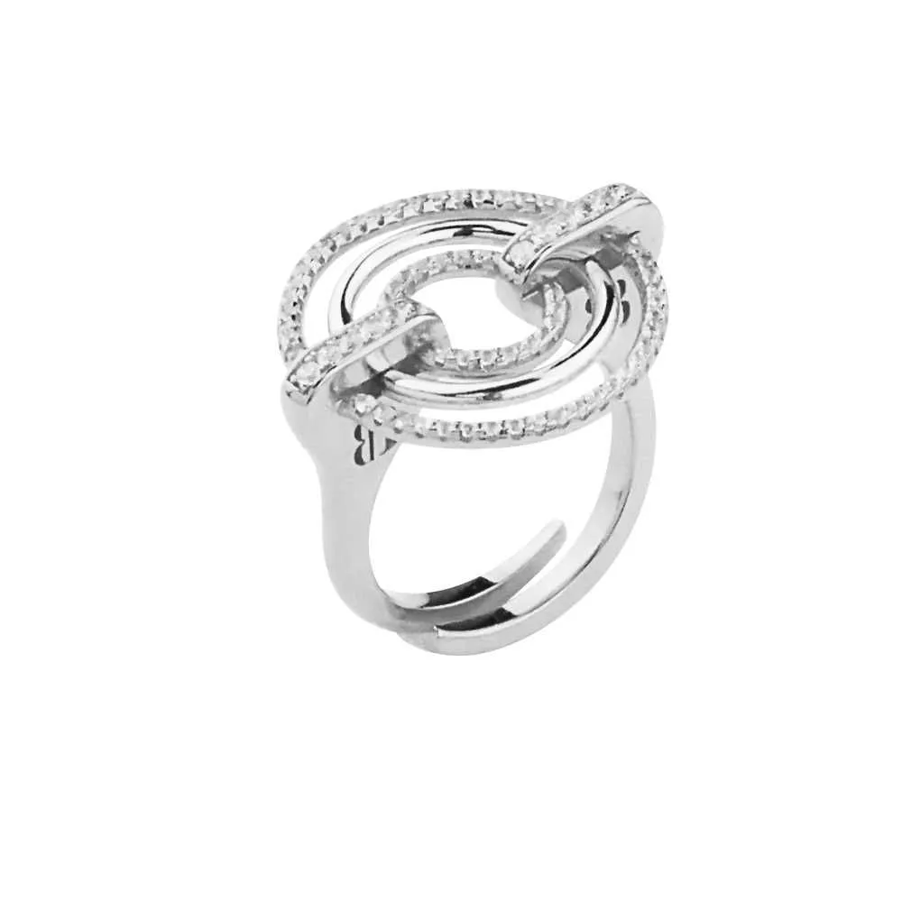 Anello in argento rodiato con cerchi concentrici e zirconi