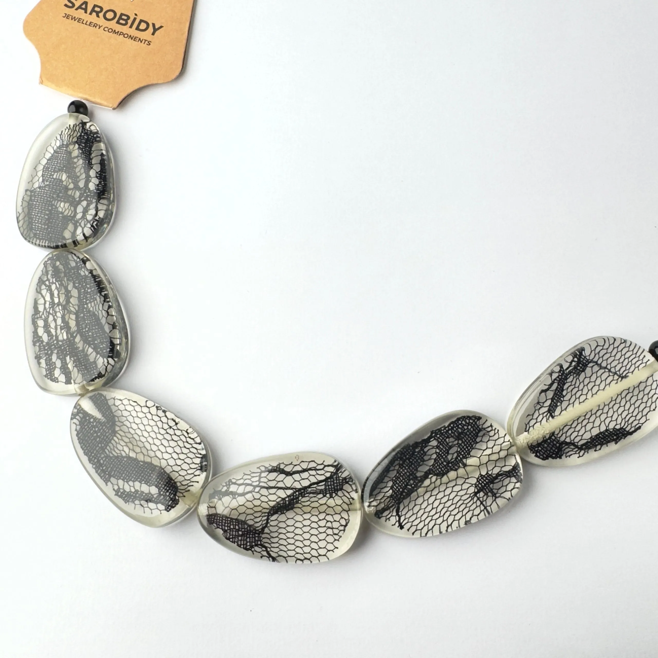 Perle in Resina Ovale Trasparente e Nero - 40 mm x 25 mm