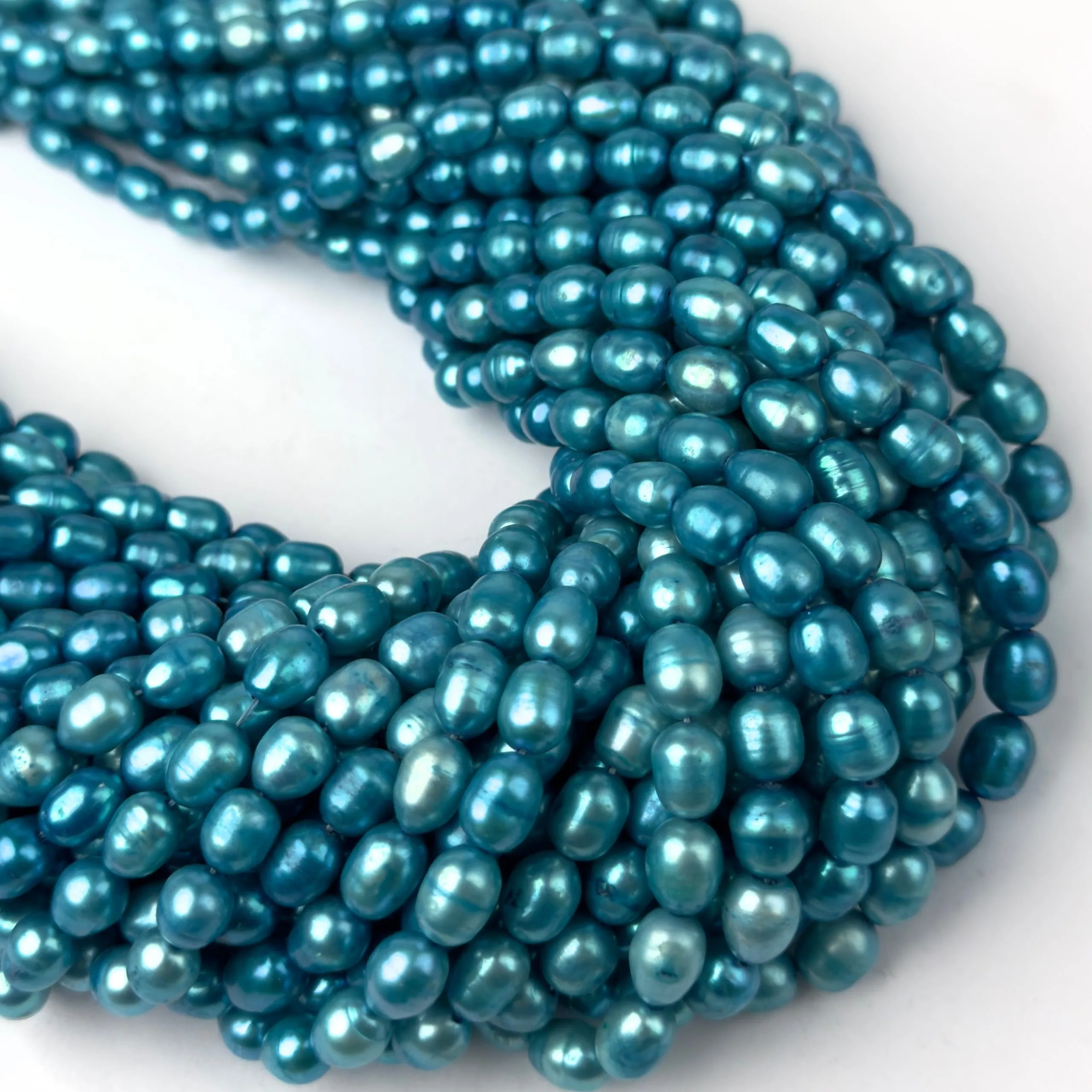 Perle di Fiume Ovale Celeste 8mm - Qualità AA