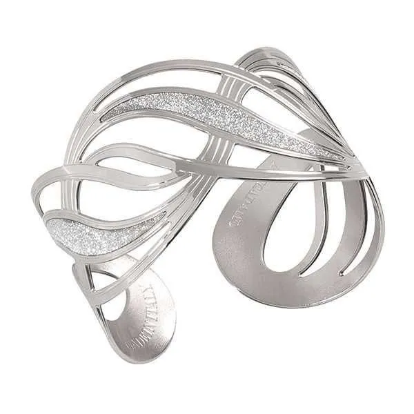 Bracciale rigido rodiato con superfici glitterate a forma di nodo d'amore