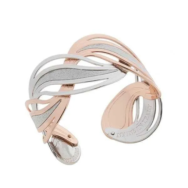 Bracciale rigido bicolor con intreccio a forma di nodo d'amore