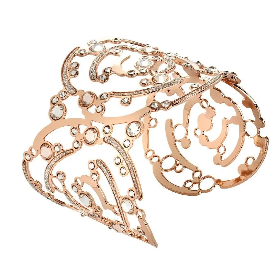 Bracciale rigido rosato con decoro a vortice, glitter e Swarovski