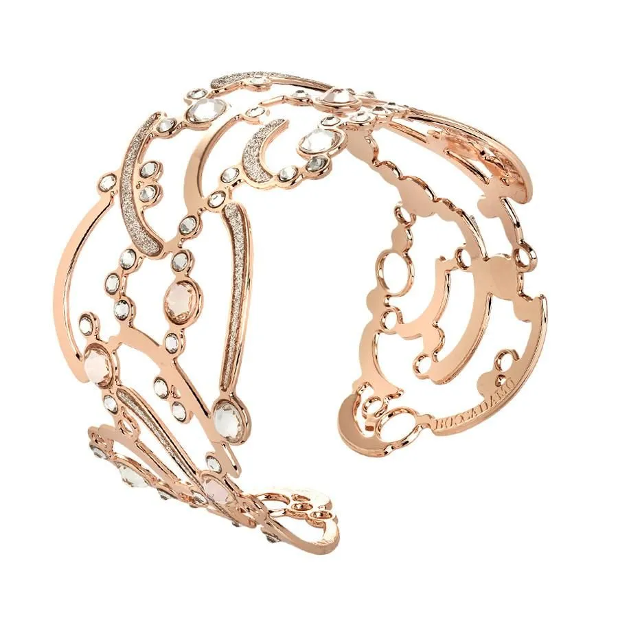 Bracciale rigido rosato con superficie decorata da glitter e Swarovski