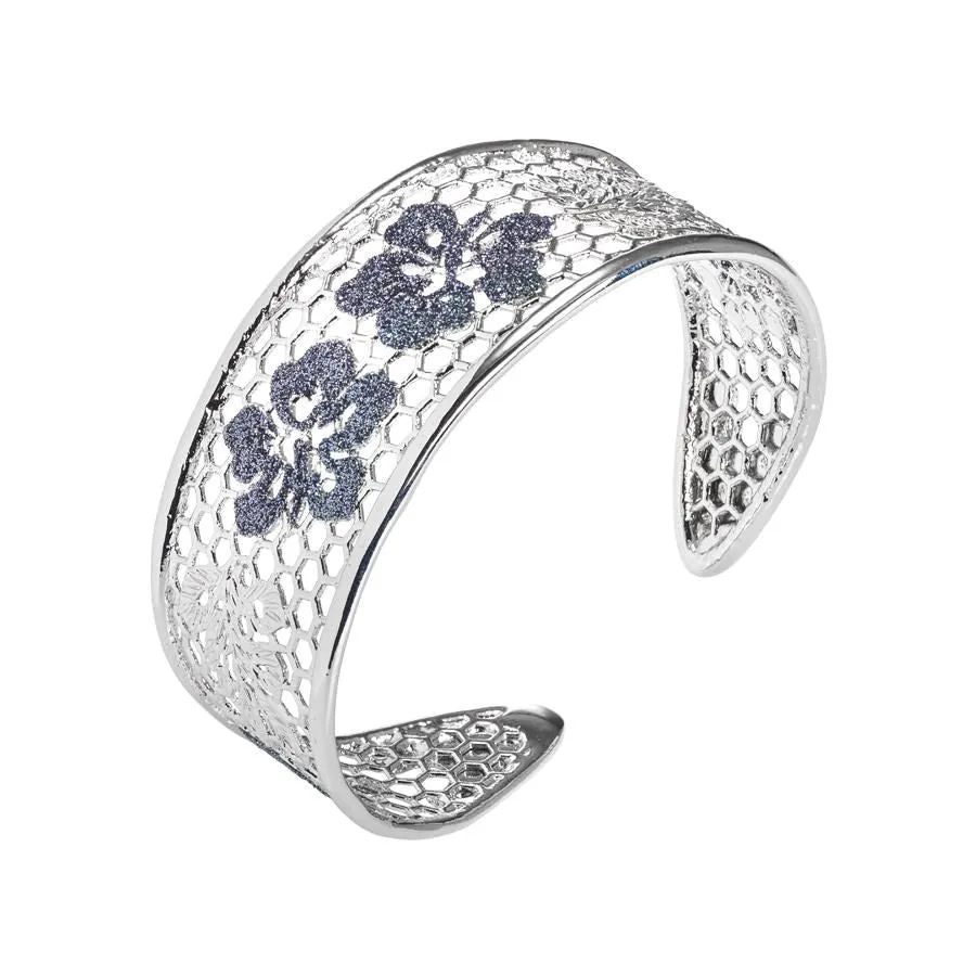 Bracciale rigido con decoro floreale in glitter black