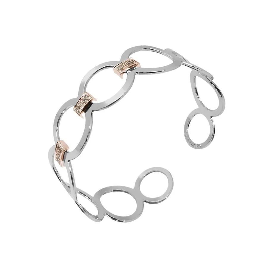 Bracciale rigido con motivo circolare e zirconi