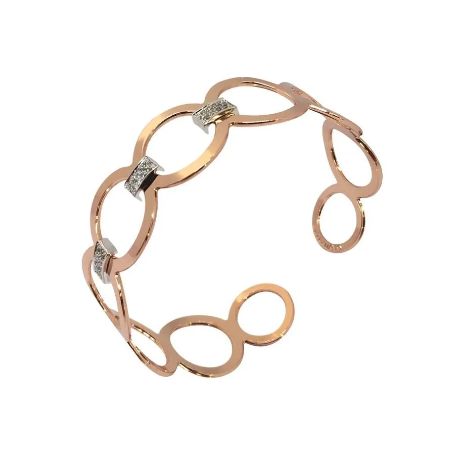 Bracciale rigido rosato con motivo circolare e zirconi