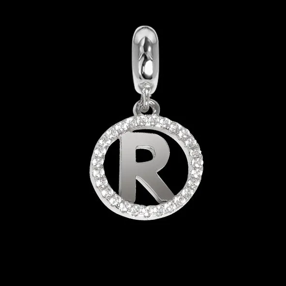 Charm circolare in zirconi con lettera R