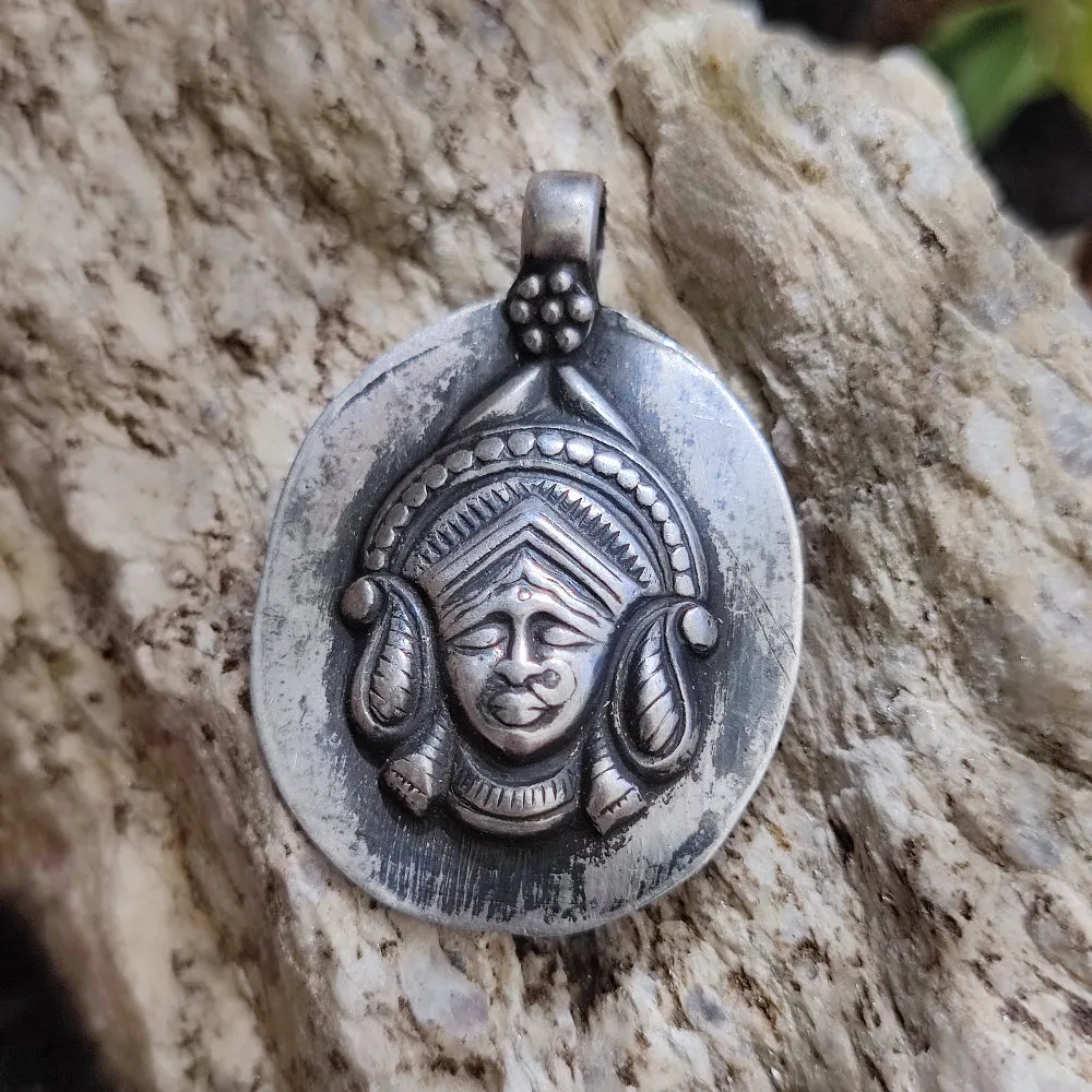 Antique silver pendant with deity - SURYA